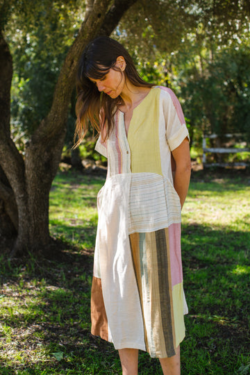 This dress is made in collaboration between Erica Kim @ahistoryofarchitecture and World of Crow, This dress has woven patches of different desert colors, it is made with handwoven fabric