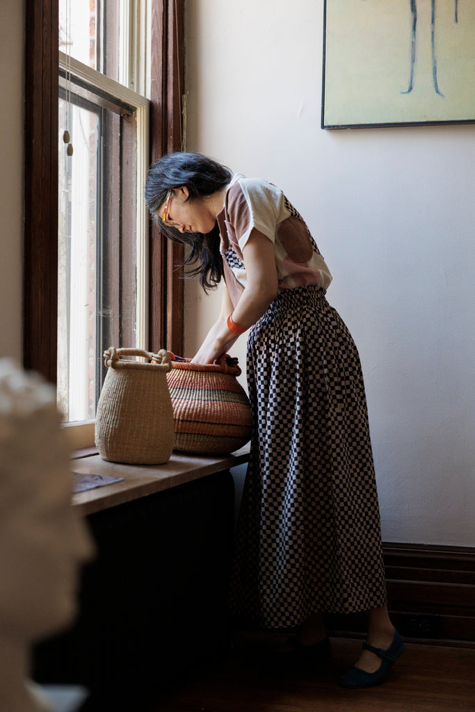 Checkered block printed, black and white skirt, ankle length, this skirt is made in collaboration between Erica Kim and World of Crow, smocked elasticated waist, sustainably made