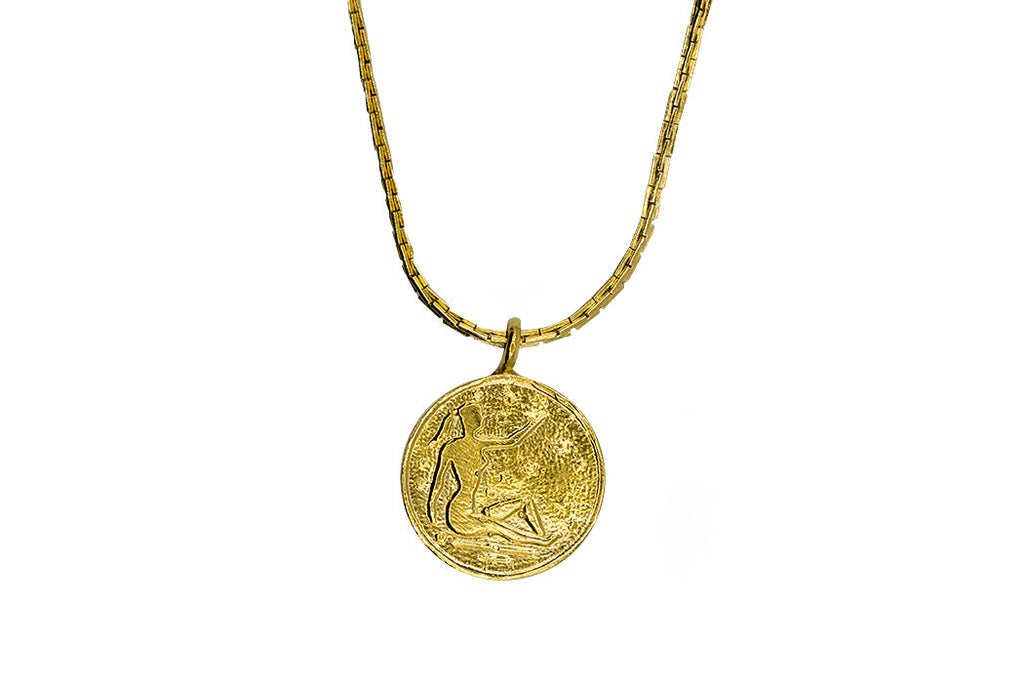 Introducing the Vintage Goddess Coin Necklace, featuring two coins on a 14K gold-plated curb chain. Made from recycled brass, this necklace combines timeless elegance with modern sustainability. Crafted in NYC and LA, it’s a luxurious yet eco-friendly addition to your collection.