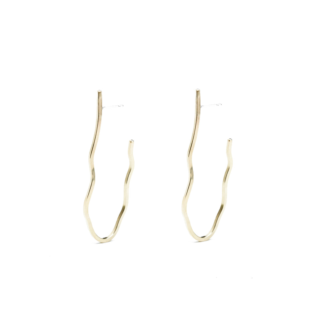 Introducing our Atoll-Shaped Hoops, crafted in solid recycled sterling silver and gold-fill, available in sizes S and M. Handcrafted in our NY studio, each unique hoop features solid sterling silver posts and backs, forged by hand with ethically sourced metals to reflect the distinctive beauty of an atoll.