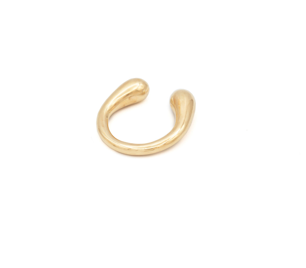 Introducing the Gold Horseshoe Earring, sustainably hand-casted from seapods gathered along the North Fork LI shores. Available in sizes Small and Medium/Large, this unique earring combines eco-conscious craftsmanship with timeless elegance. Each piece celebrates the beauty of nature while supporting marine conservation.