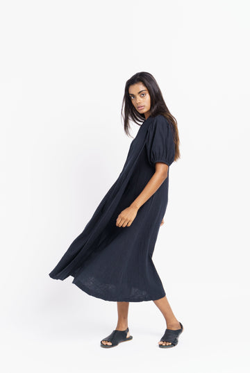 A classic ink black midi dress, sustainably produced clothing, sustainably sourced clothing brands, womens organic clothing, 100 organic cotton pants, ladies cotton clothing, shop cotton clothing, 100 cotton women's, women's organic clothing, minimalist clothing style, minimalist outfits women