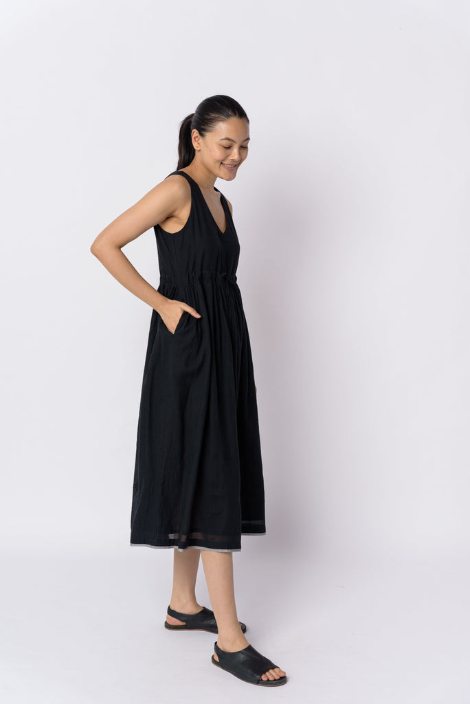 Black front tie-up dress, best sustainable women's clothing, clothing brands sustainable, organic jackets women's, women's organic dresses, cotton clothing website, organic cotton women's clothing, organic women's shirts, women's natural fiber clothing, minimal online shop, minimal store online